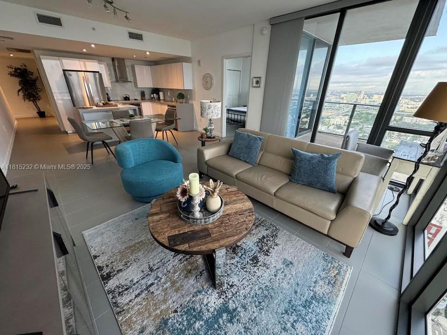 Live your best Miami Life in this luxurious, fully furnished, amenity-rich two-bedroom corner unit, featuring floor-to-ceiling windows that take you to see the Bay and the city with unobstructed views. This high-end
modern appliances and upscale finishes are ready to enjoy from day one (open to renting unfurnished). Comes with in-building storage, two parking spots, and in-unit laundry. Canvas Condos has all your wellness needs with chic amenities including three pools, an upscale gym, a movie theater, saunas, massage rooms, a racquetball court, a social kitchen, a game room, a business center, and a rooftop terrace. Restaurants, coffee shops, supermarkets, pharmacies, and the famous Adriana Arsh Center surround the area. Enjoy your best Miami Life. This is a Must-See! You will love it!
