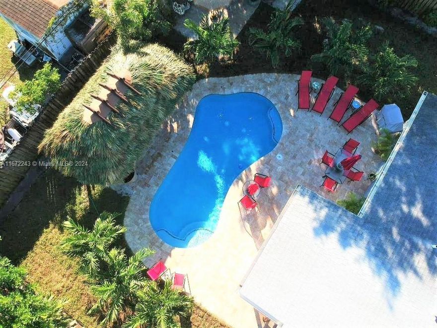 Welcome home to this well-appointed starter house with impact windows throughout, in the heart of Fort Lauderdale. Offering a beautiful backyard oasis with a free form pool including a water feature, travertine pool deck, tiki hut, cedar shed and covered boat parking... great for entertaining. Kitchen updated with new appliances that includes a wine cooler in 2022. Excellent location just minutes from the beach, Ft. Lauderdale airport, Port Everglades and many shops and restaurants.