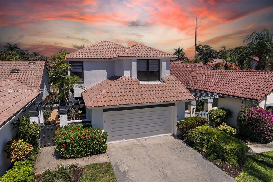 Wonderful opportunity in the heart of Central Boca Raton! This stunning home showcases tile flooring throughout, a beautifully updated kitchen with custom wood cabinetry and granite countertops, and classic plantation shutters. The expansive living area features soaring ceilings that open to the second floor, creating a bright, airy space filled with natural light. Situated within a quiet, 24-hour gated community, this residence offers both comfort and convenience. Ideally located just minutes from Town Center at Boca Raton, Mizner Park, top-rated schools, fine dining, and a short drive to the beach, this is the perfect place for enjoying quality time with family and friends. This is a home you won’t want to miss. Contact the listing agent today to schedule your private showing!
