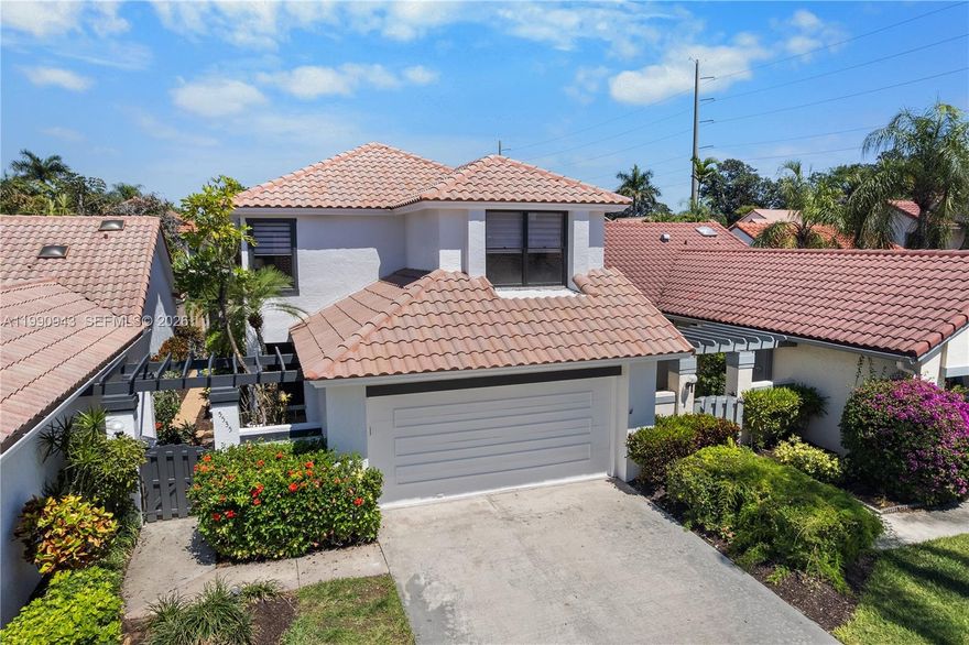 Wonderful opportunity in the heart of Central Boca Raton! This stunning home showcases tile flooring throughout, a beautifully updated kitchen with custom wood cabinetry and granite countertops, and classic plantation shutters. The expansive living area features soaring ceilings that open to the second floor, creating a bright, airy space filled with natural light. Situated within a quiet, 24-hour gated community, this residence offers both comfort and convenience. Ideally located just minutes from Town Center at Boca Raton, Mizner Park, top-rated schools, fine dining, and a short drive to the beach, this is the perfect place for enjoying quality time with family and friends. This is a home you won’t want to miss. Contact the listing agent today to schedule your private showing!