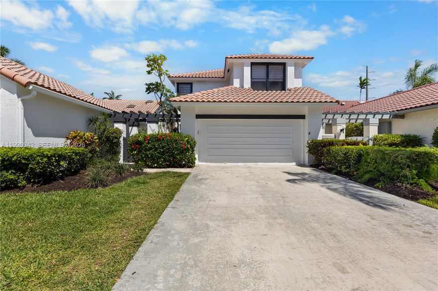 Wonderful opportunity in the heart of Central Boca Raton! This stunning home showcases tile flooring throughout, a beautifully updated kitchen with custom wood cabinetry and granite countertops, and classic plantation shutters. The expansive living area features soaring ceilings that open to the second floor, creating a bright, airy space filled with natural light. Situated within a quiet, 24-hour gated community, this residence offers both comfort and convenience. Ideally located just minutes from Town Center at Boca Raton, Mizner Park, top-rated schools, fine dining, and a short drive to the beach, this is the perfect place for enjoying quality time with family and friends. This is a home you won’t want to miss. Contact the listing agent today to schedule your private showing!