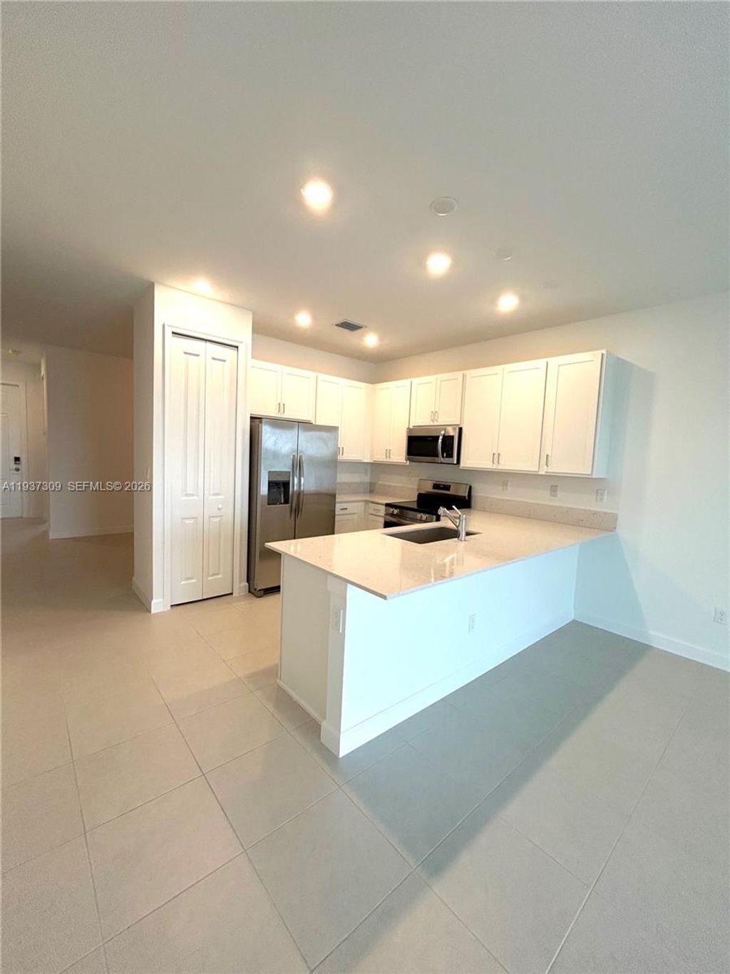 Photo of 6412 Seabright Ter #310, Fort Pierce, FL 34946 (MLS # A11937309)