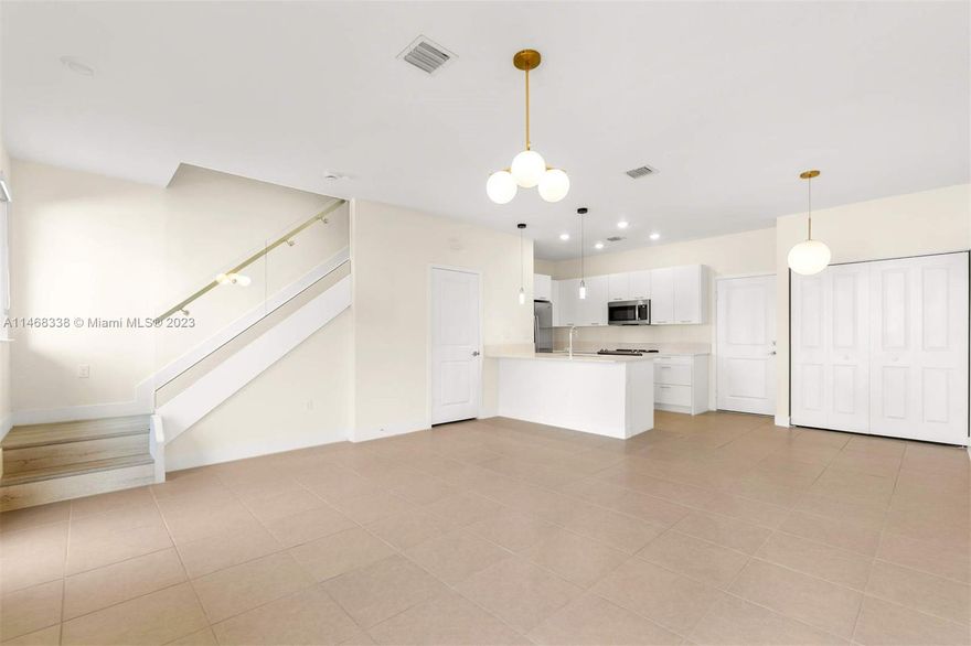Modern resort-style townhouse in the heart of sought-after downtown Doral. It has been exquisitely upgraded with California closets and panty, black-out blinds, and modern light fixtures, all of which are included. This home features three bedrooms, two full bathrooms, a half bath, and a two-car attached garage. 1,963 square-feet including the garage and covered balcony. You'll also enjoy access to the best Doral schools, as well as convenient proximity to airports, shops, restaurants, and sports facilities. This is the perfect opportunity to experience a luxurious lifestyle in the heart of Doral.