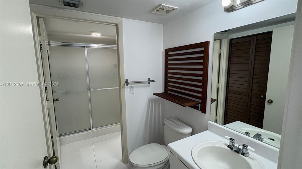 Photo of 9560 Weldon Cir #J308, Tamarac, FL 33321 (MLS # A12012497)