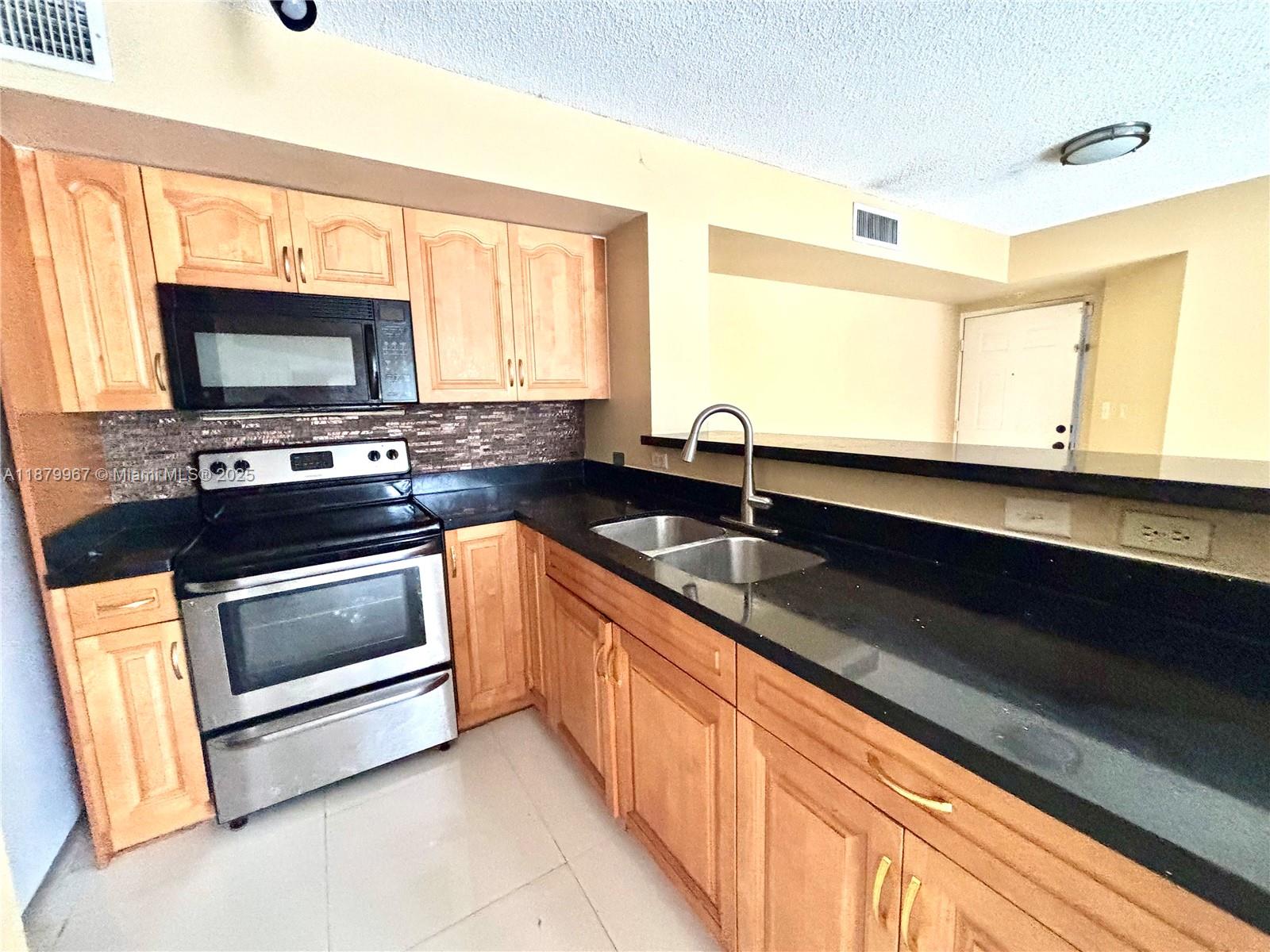 DEVONAIRE CONDO AT PEMBRO - Residential