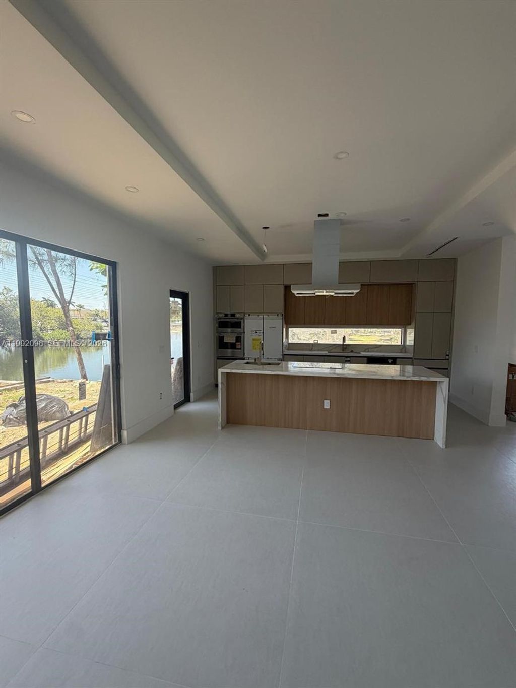 Photo of 201 NW 14 Way, Dania Beach, FL 33004 (MLS # A11992098)