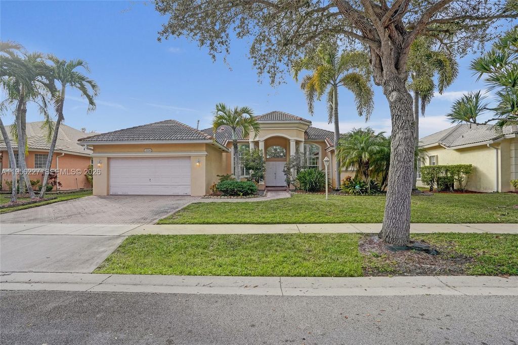 Photo of 2024 NW 139th Ter, Pembroke Pines, FL 33028 (MLS # A11956227)