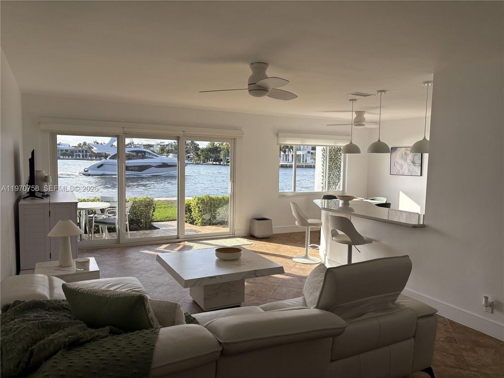 Photo of 1201 S Riverside Dr #107, Pompano Beach, FL 33062 (MLS # A11970758)