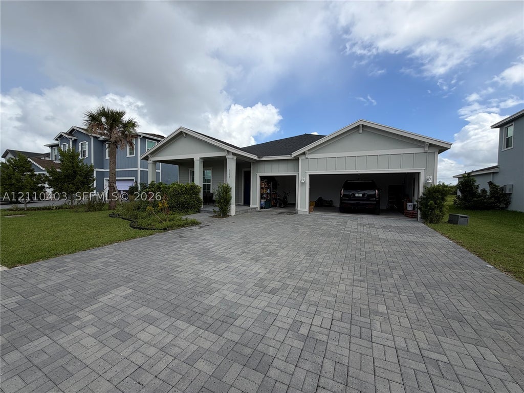 Photo of 1172 Tangled Orchard Trce, Loxahatchee, FL 33470 (MLS # A12110403)