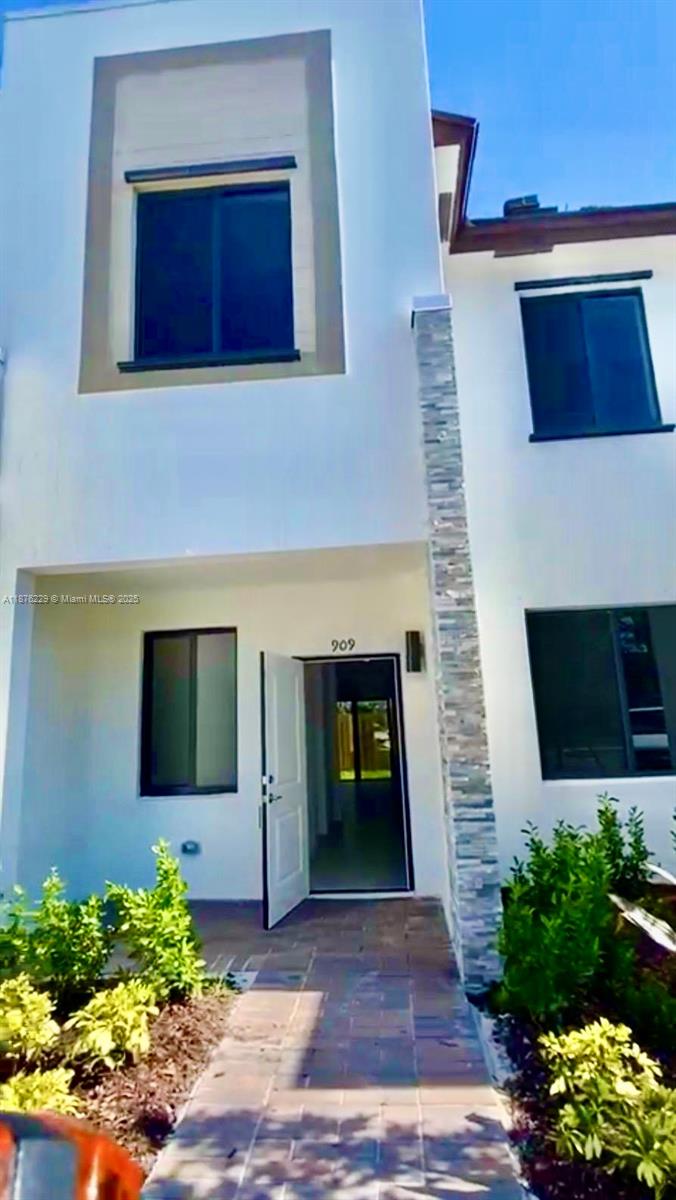Beautiful 3-bedroom, 2.5-bath townhouse built in 2022 with nearly 1,500 SF of modern living space. This almost-new home features a spacious layout, including a family room. It has laminated wood floors in the second floor and a private backyard patio—perfect for entertaining or BBQs. The community offers resort-style amenities including a sparkling swimming pool, fitness center, clubhouse, lake with walking paths, park, and soccer field. Conveniently located near shopping, dining, and major highways. Move-in ready and waiting for it's new owner!