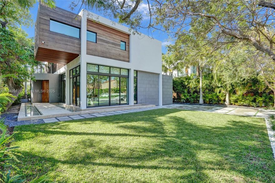 JUST COMPLETED! NEW CONSTRUCTION!!Experience modern beach living in this 7,500 Sq Ft luxury single family home designed by world renowned architect Chad Oppenheim. Complete luxury furniture package from Artefacto. With 6 bedrooms, 6,5  bathrooms, guest wing, and service quarters this tremendous residence is surrounded by lush beach landscaping and includes a tranquility pond, sun deck and outdoor kitchen. The incredible amount of indoor and outdoor space, the connectivity between them, and the richness of materials elicits the sites inherent power and garners recognition as one of the most special homes.