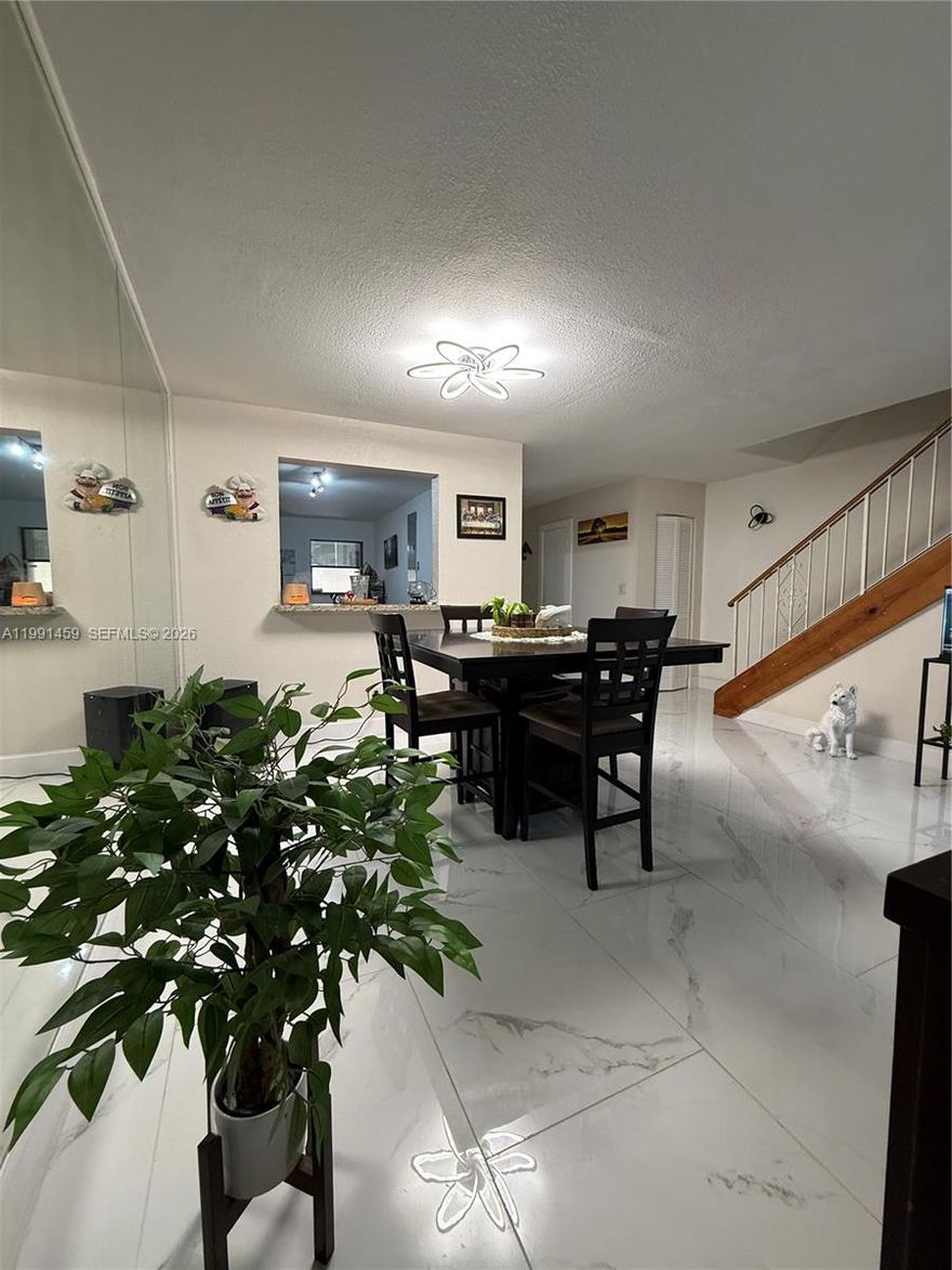 Beautiful and spacious 2-bedroom, 2-bathroom townhouse located in the heart of Doral, featuring a versatile extra room currently used as a third bedroom. This additional space is perfect for a home office, guest room, or playroom. Offers bright and open living areas with ceramic tile flooring and a functional layout ideal for everyday living and entertaining. Located in a well-maintained community with resort-style amenities including 24-hour security, swimming pool, tennis courts, and clubhouse. The association covers cable, internet, water, landscaping, and exterior maintenance. Prime location close to top-rated schools, shopping centers, restaurants, and major highways.