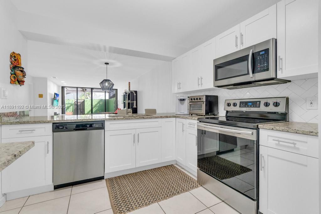 Photo of 8880 SW 133rd Pl #A, Miami, FL 33186 (MLS # A11891192)