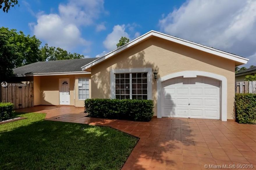 Step inside and fall in love with this beautiful home. It is tiled throughout, neutral color paint, great floor plan , chef's kitchen with dark wood cabinetry and ample counter space, sliders lead out to fenced yard and patio. See this turnkey home and submit your best offer now. You don't want to miss this one.This property is bank owned. It is sold in “as-is” condition without repairs or warranty. Buyer is responsible for verifying all information contained in this listing.