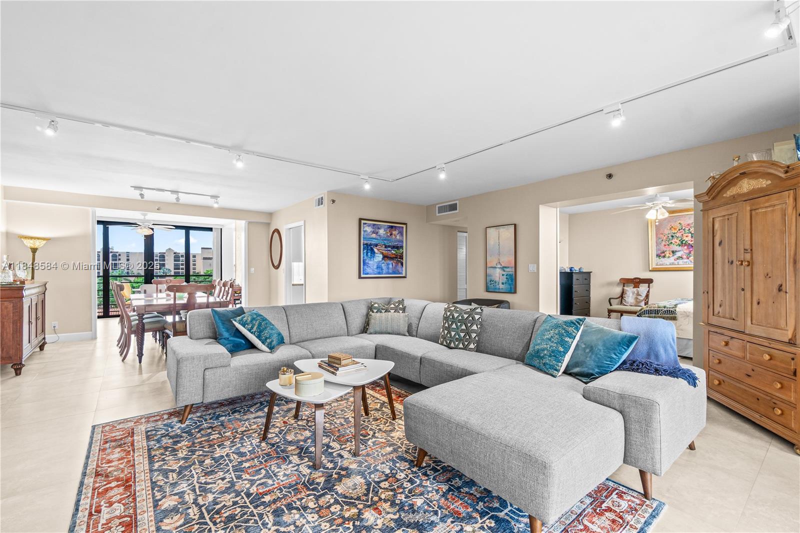 A rare opportunity to purchase a pristine, Brittany designed condo in Boca Pointe with
porcelain tiles floors throughout the unit. It has 3 bedrooms and 2 ½ baths, lovely
kitchen and sizeable living and dining rooms. Patio was enclosed in 2014 (added
100+sqft). Spacious Master suite with large bathroom and a fabulous closet space. The
second room is also a suite. The third bedroom has barn doors; it can be used as an
office or a den. Gorgeous views of the golf course. The unit is storm protected by impact
windows, impact doors at the patio and shutters at the balcony. Covered parking space
is very close to the front door. Condominium pool, card rooms and Boca Pointe Golf
Course and Club within walking distance.