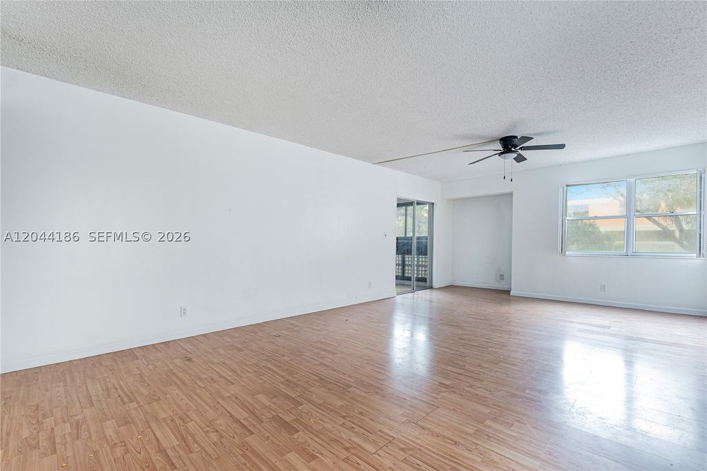 Photo of 3301 Spanish Moss Ter #406, Lauderhill, FL 33319 (MLS # A12044186)