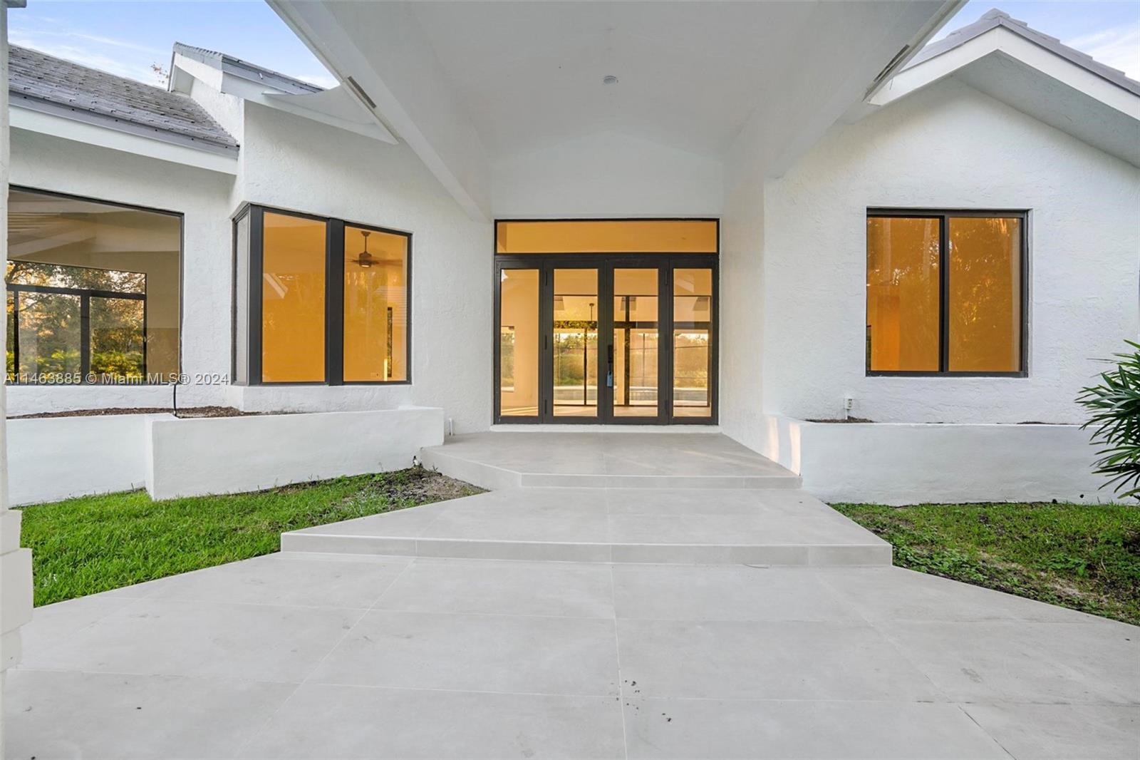 Presenting an exceptional residence nestled on an elevated 1.6 acre lot in the prestigious guard gated community of Windmill Ranch Estates. The updated kitchen and cabinetry has been installed as shown in the renderings. Some additional notable features include impact glass (windows, doors and garage) throughout, tankless water heater, whole house water softener, oversized pool screen enclosure, a 600 square foot lanai with a built-in BBQ area and more. The lush landscaping provides privacy and an oasis feel to the property. This home boasts 4 bedrooms, 4 bath and 3,017 sq. ft.