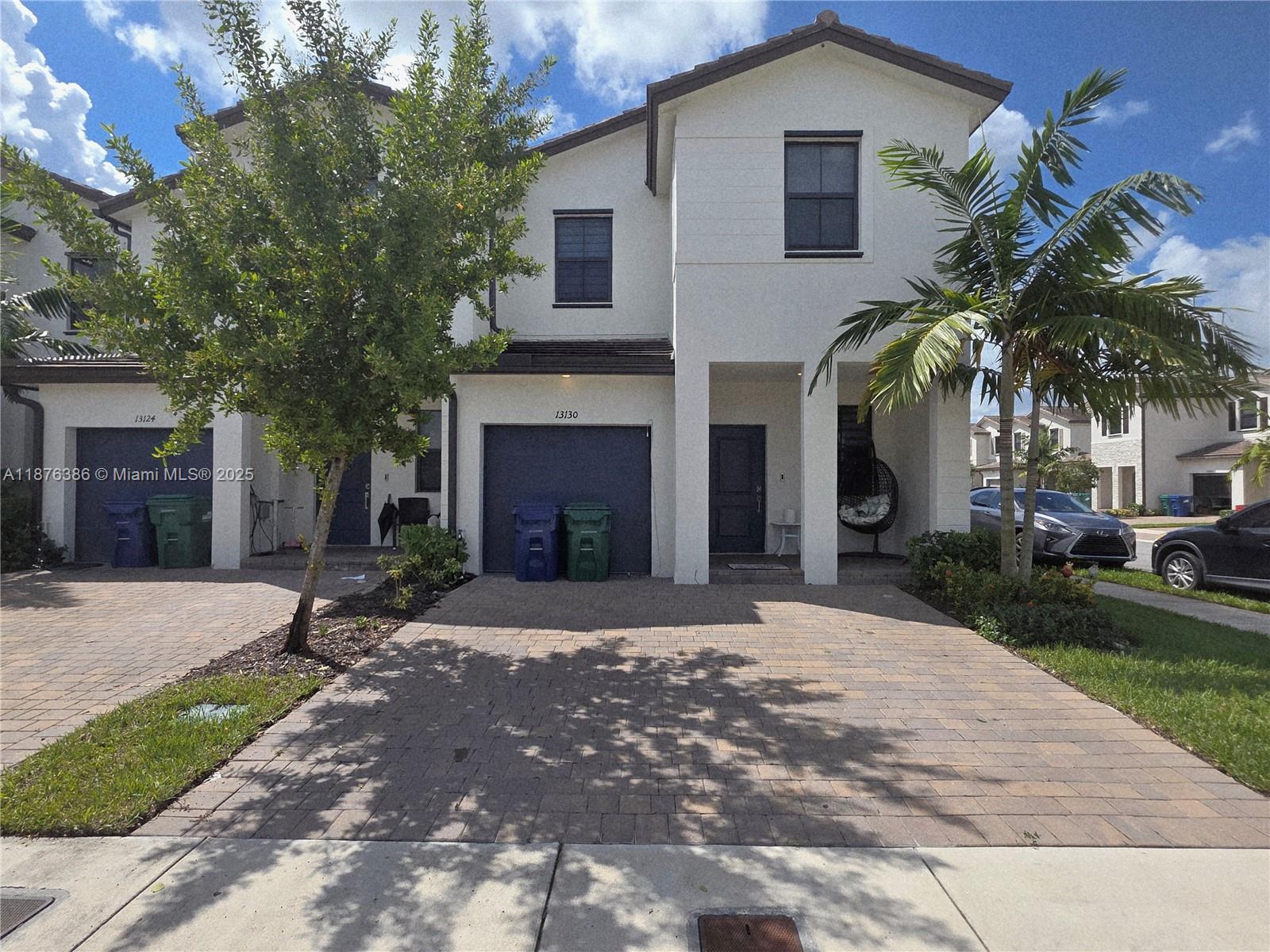 Welcome to this spacious corner unit townhouse featuring 1,827 sq ft of living area. This home offers an open and inviting layout with a large living and family room area, perfect for entertaining or relaxing. Features include Modern stainless steel appliances, Good-sized bedrooms with walk-in closet, No carpet – easy to maintain floors throughout, Private patio for outdoor enjoyment, Bright and airy corner unit with plenty of natural light, Prime Location! Close to major highways, shopping centers, schools, and more for your convenience. This home truly combines comfort and convenience — ready for you to move in and enjoy! Rental price: $3,000 unfurnished and $3,300 furnished