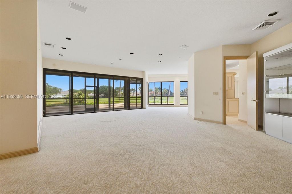 Photo of 7383 Orangewood Ln #301, Boca Raton, FL 33433 (MLS # A11992690)