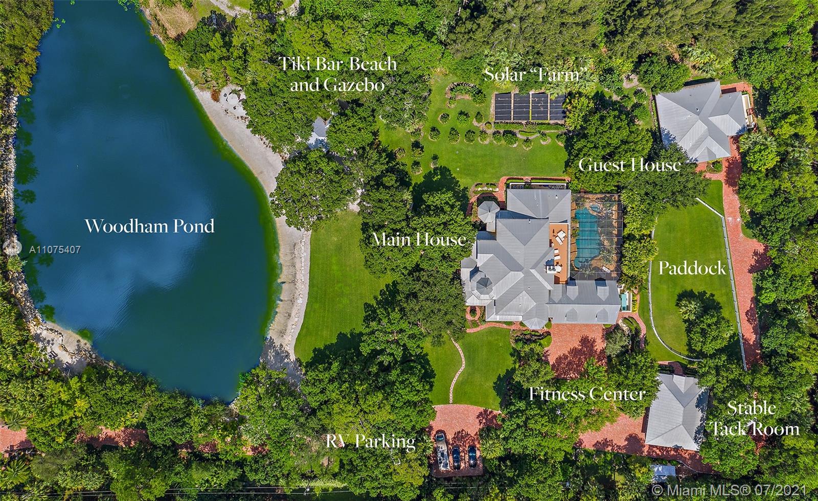Welcome to Woodham Lodge a 7 BR, 7 FB, Victorian Manor Home set on 5 acres and featuring: a .20 mile Brick Drive, Pond & Tiki Bar/Beach Gazebo, 3 Car attached garage,Fitness Center, Stable, Tack Room,Paddock, 2BR guest house with garage. Woodham Lodge has “a look” because no details were overlooked, from the 18th Century Armoire that “secretly” opens into the stunning Master Suite, to the 478 bottle wine cellar and wall to wall hardwood/marble, floors. The property features a 5-Star Lagoon Pool with, gas torch lights, water slide, grotto, fabulous outdoor kitchen, living/dining areas. The Stable is complete with, A/C Tack Room and paddock. The property is safe with CBS Construction, Impact Windows, Whole House Generator and Smart Technology. A Close to everything-South Florida location!