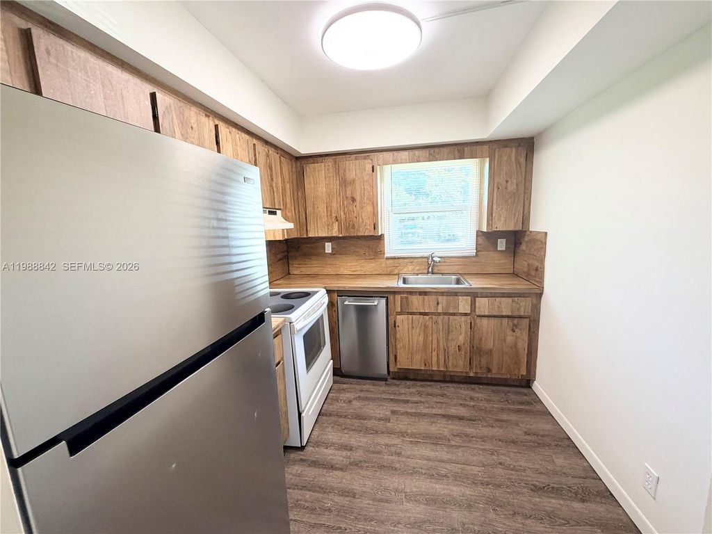 Photo of 6131 SW 42nd Ct #6131, Davie, FL 33314 (MLS # A11988842)