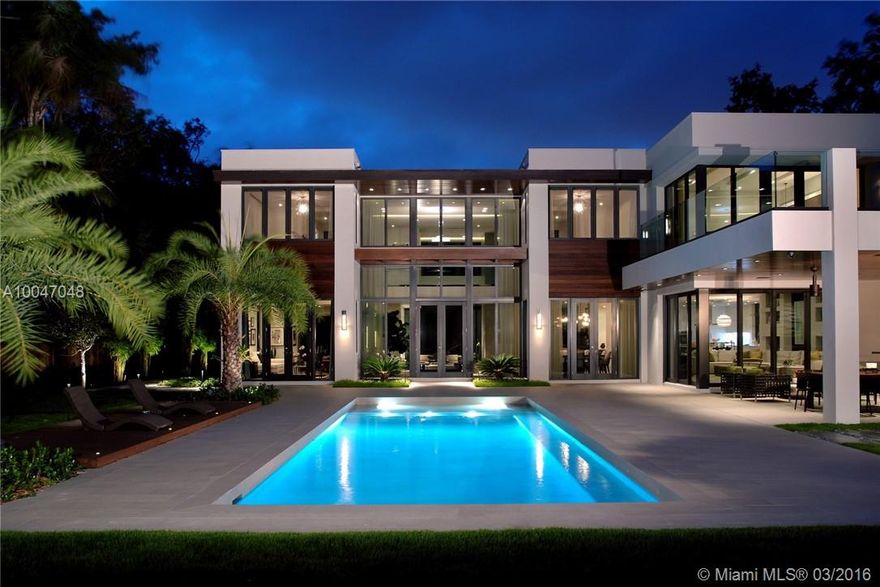 Modern Masterpiece in Coveted Coconut Grove! Built in 2013, this Brett Sugarman-designed showplace in Miamis hippest community is defined by the elements of geometry, water and light, not to mention total luxuriousness. Stylish elegance meets comfortable practicality in 7,253 SF of impeccable living space on 2 stories, featuring an elevator, 5 BRs, 6 baths and dramatic entertaining areas. Large outdoor spaces, a pool, putting green, basketball court and summer kitchen create the ultimate resort setting.