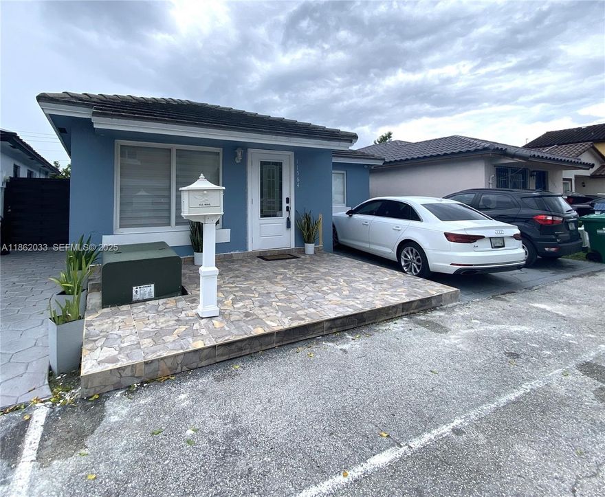 REMODELED HOME featuring IMPACT WINDOWS AND DOORS, 2019 ROOF, 2023 A/C, and 2024 LG front-load washer and dryer.  This home has ALL the insurance credits you will need !! Ideally located near FIU, major malls, top restaurants and expressways, this lovely residence offers it all.  The wood kitchen includes stainless steel applicances and 2 refrigerators are included in the sale.  Bathrooms have been beautifully remodeled, the home has a tankless water heater and one bedroom offers a private side entrance-ideal for guests or extended family. The property provides parking for up to 4 vehicles (two in the driveway and two parallel). A cozy tiled backyard with modern ceiling fans creates the perfect setting for relaxing or entertaining.  Ronselli Park offering a wide range of recreational facilities, including baseball, basketball, pickleball + more is in close proximity to the home.  Schedule your visit today !