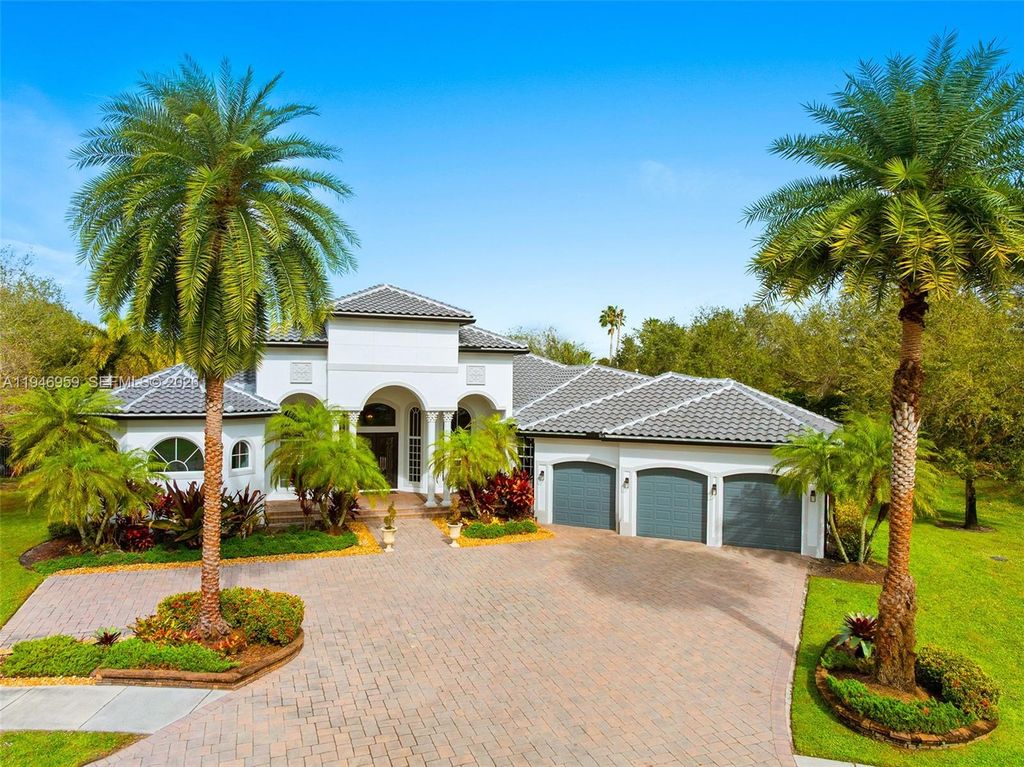 Photo of 12401 N Stonebrook Cir, Davie, FL 33330 (MLS # A11946959)