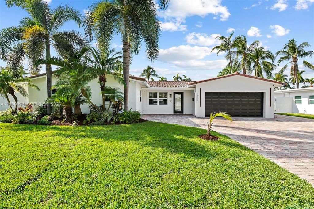 Photo of 1931 NE 32nd Ave, Fort Lauderdale, FL 33305 (MLS # A11950536)