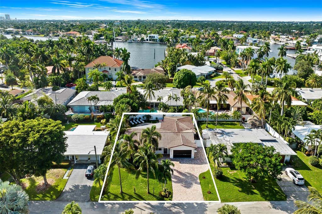 Photo of 1931 NE 32nd Ave, Fort Lauderdale, FL 33305 (MLS # A11950536)