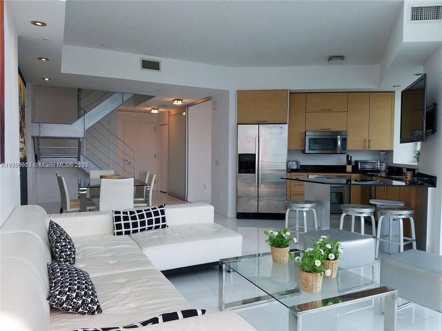 SPECTACULAR FULLY FURNISHED 2 STORY,DRAMATIC HIGH CEILING 3 BEDS 3 BATHS CORNER UNIT PANORAMIC
 VIEW,CITY AND OCEAN FROM EVERY ROOM. CONTEMPORARY LOBBY,JACUZZI,SPA AND POOL. FULL SERVICE
 BUILDING WITH 24HRS,FRONT DESK AND VALET PARKING. WALKING DISTANCE TO SHOPPINGS MARY BRICKELL
 VILLAGE,RESTAURANTS AND ALL THE FUN OF URBAN LIVING. IT IS AVAILBLE ON MAY  2026 1-2-3-4 MOMTHS