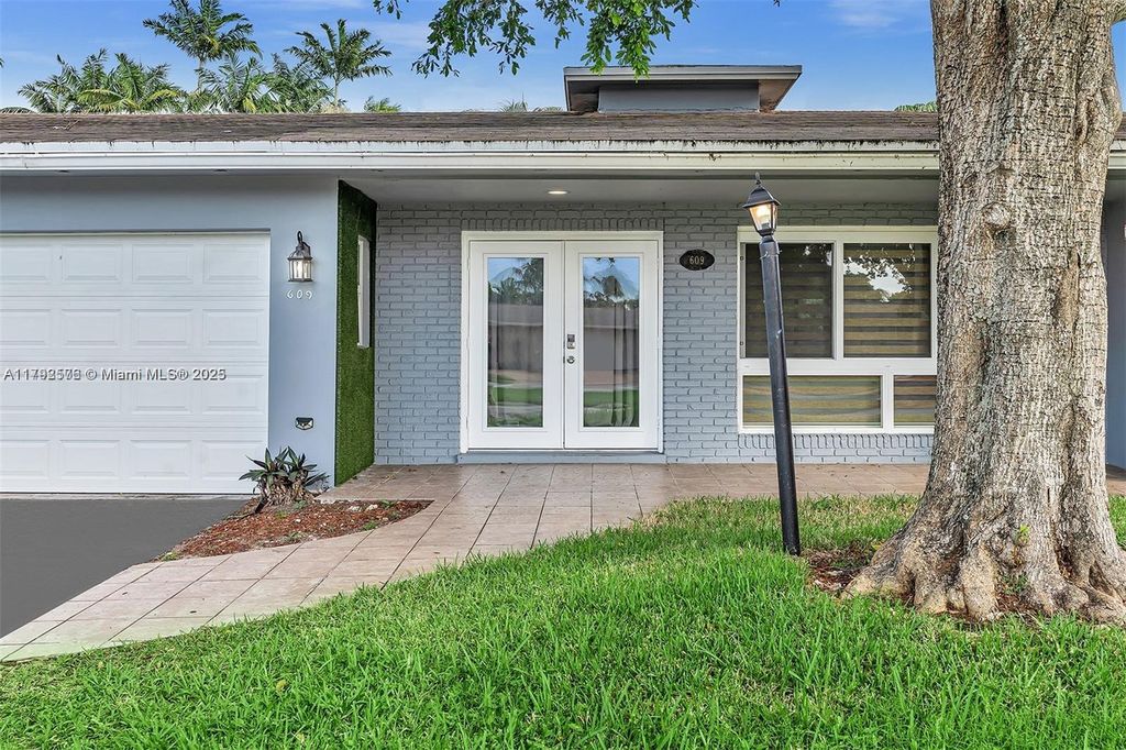 Photo of 609 N 46th Ave, Hollywood, FL 33021 (MLS # A11792576)