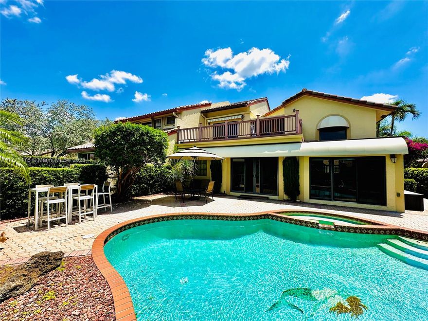 Stunning 3-bedroom, 3-bathroom home with a pool and jacuzzi, offering  lake and golf course views.
 This beautiful property features impact windows, high ceilings, and abundant natural light throughout. Recently
 renovated bathrooms and elegant marble floors add. Located in a gated community, the home
 includes a spacious 2-car garage and a long driveway for additional parking. Open floor plan perfect for
 entertaining and watch the sunset across the golf course. Conveniently close to freeways and restaurants for easy
 access to everything you need.