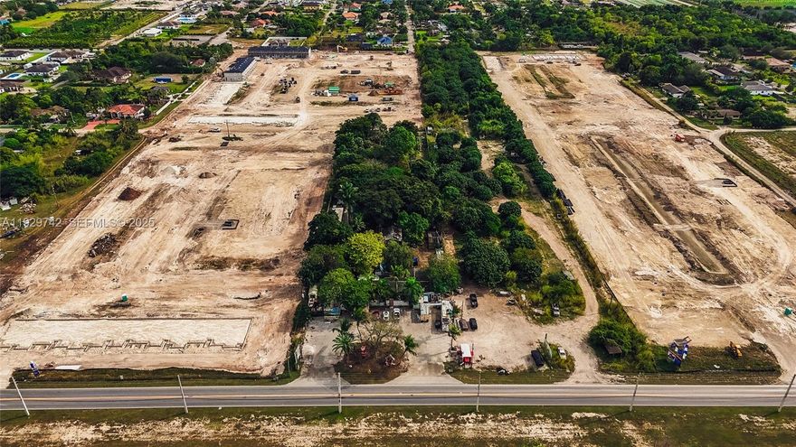 LAND IN THE PATH OF  PROGRESS-HOMESTEAD 1.9 acres  plus a potential of an additional 5 acres  A GRAND TOTAL OF 7 ACRES ( additional cost 5 MILL) in a rapidly developing area where major developers have already acquired land and begun construction of townhomes over $300,000. Water and Power and a paved two lane street in place... This is a rare opportunity to secure land in the path of growth with strong upside potential. IDEAL FOR INVESTORS, DEVELOPER..