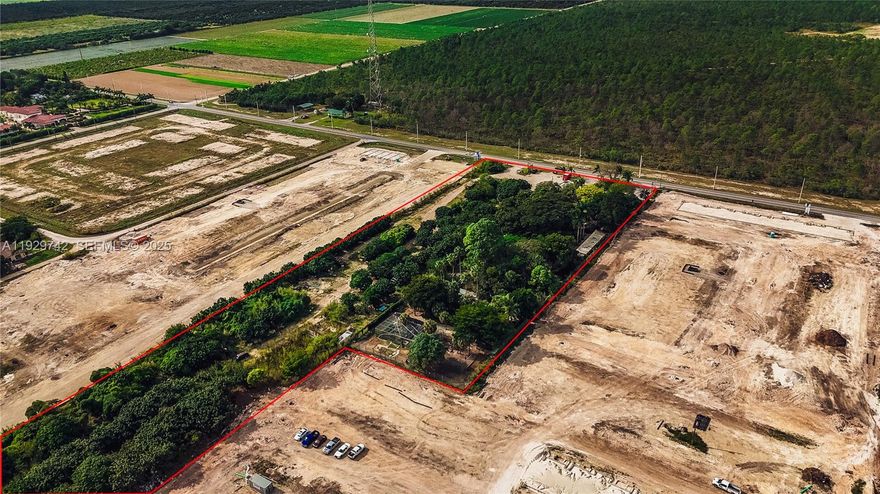 LAND IN THE PATH OF  PROGRESS-HOMESTEAD 1.9 acres  plus a potential of an additional 5 acres  A GRAND TOTAL OF 6.9 ACRES ( additional cost 5 MILL) in a rapidly developing area where major developers have already acquired land and begun construction of townhomes over $300,000. Water and Power and a paved two lane street in place... This is a rare opportunity to secure land in the path of growth with strong upside potential. IDEAL FOR INVESTORS, DEVELOPER..