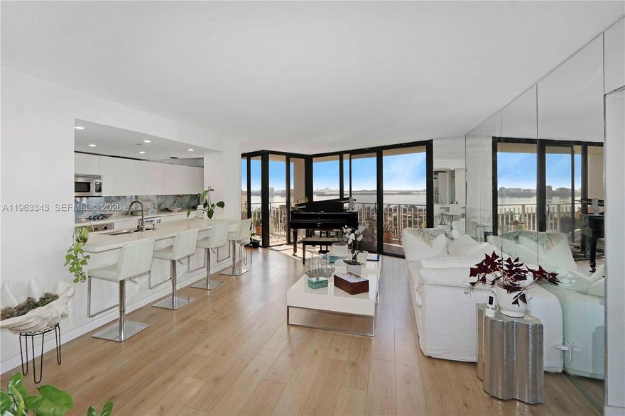 Live Where Miami Comes Alive—Yet Feels Like a Retreat.  Nestled within 37 lush waterfront acres in NE Miami, just steps from Biscayne Bay, this beautifully designed residence offers the perfect blend of serenity, luxury, and convenience.  Designer finishes throughout, Chef’s kitchen featuring a full suite of Viking appliances (cooktop, oven, dishwasher, microwave/hood & refrigerator), 48-bottle wine refrigerator—perfect for entertaining, Breathtaking views of sunrises, sunsets, full moons over Biscayne Bay, and spectacular Fourth of July & New Year’s Eve fireworks, Spacious 1-bedroom with a 100+ SF dressing room, Versatile den—easily convertible to a second bedroom or office, Two full bathrooms.  Resort-Style Amenities, Full-service spa and state-of-the-art fitness center with adult & children’s classes, 7 tennis courts, 2 pickleball courts, and 2 racquetball courts, Marina, direct bay access, Residents-only waterfront restaurant & bar, Café at the spa, Children’s playground & dog park, Golf just ½ mile away at Miami Shores Country Club.  Unbeatable Location, centrally located with easy access to MIA Airport, beaches, Design District, Wynwood, South Beach, Bal Harbour, and Aventura—all just minutes away. This is more than a home—it’s a lifestyle of waterfront living, privacy, and world-class amenities in the heart of Miami.