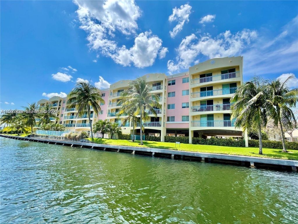 Photo of 201 S Golden Isles Dr #306, Hallandale Beach, FL 33009 (MLS # A12027478)