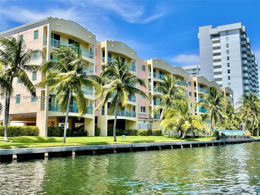 Photo of 201 S Golden Isles Dr #306, Hallandale Beach, FL 33009 (MLS # A12027478)