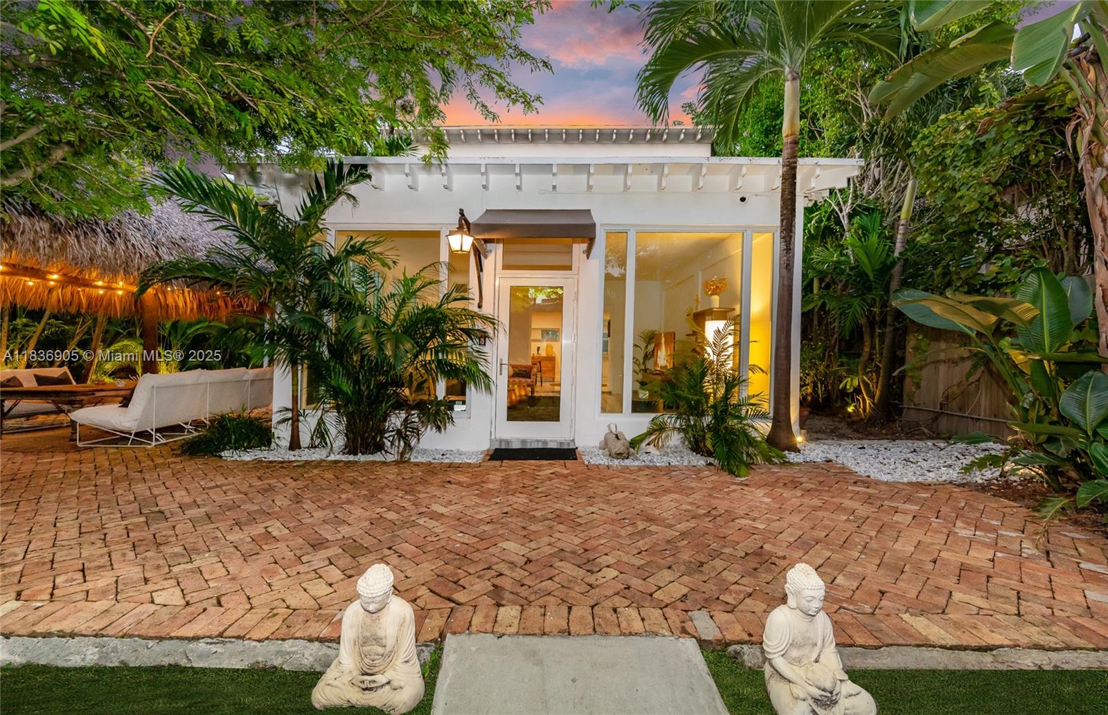 Available for 6 to 12 months! Step into a tropical oasis tucked away into a centrally located gated community within Miami. As you walk into the home you immediately feel a calming sensation and are greeted with beautiful views of nature out of each window. Hang out with friends and family underneath the palapa, BBQ, sit in the sun-filled living room atrium or enjoy a relaxing yoga session upstairs on the meditation deck. This home offers you different opportunities for any mood. Fun, Sun, or Sleep! Centrally located off of Biscayne blvd, you are a short distance away from all the excitement of Miami Beach, Design District and highway access! The gated community of Belle Meade offers a kids playground and other outdoor amenities.