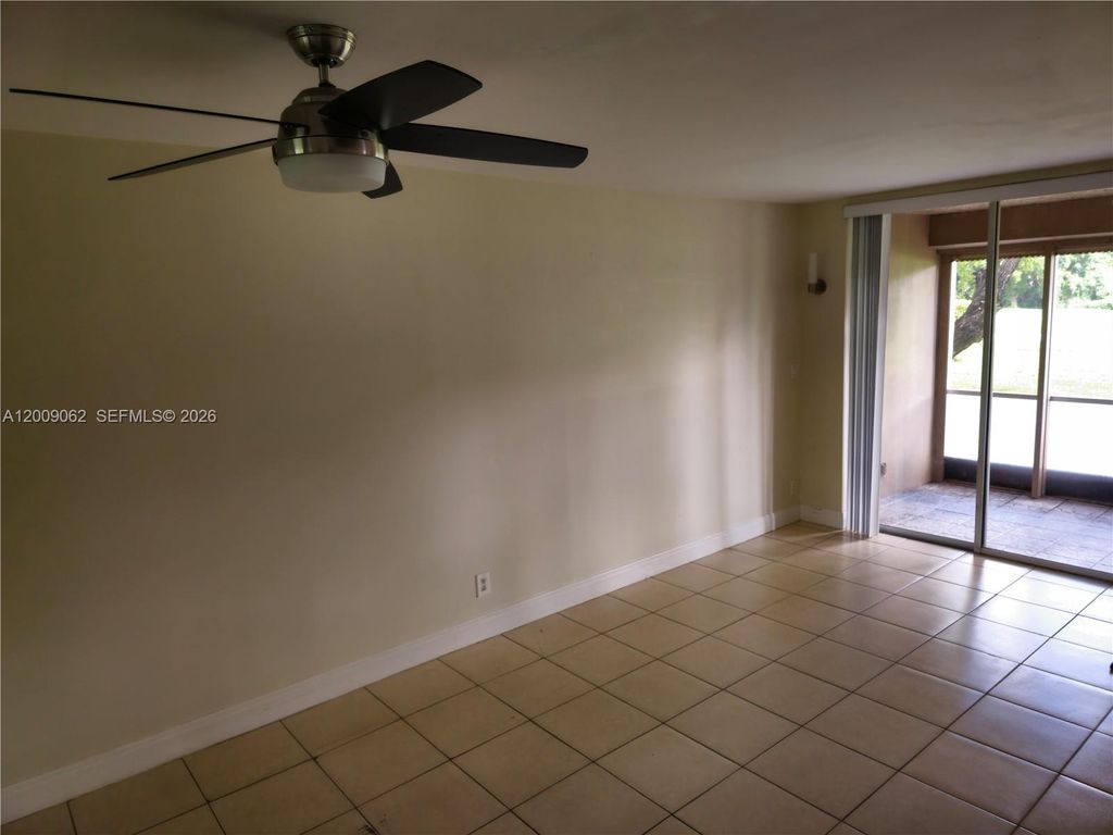 Photo of 9460 Tangerine Pl #104, Davie, FL 33324 (MLS # A12009062)