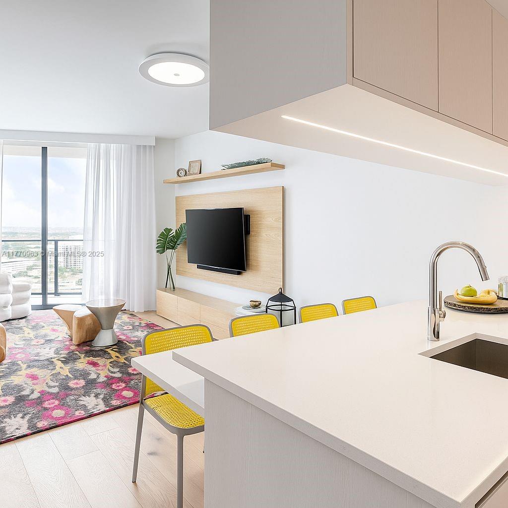 The best line in the building! This spacious floor plan is larger than most 3-bedroom units. The apartment has been completely remodeled with top-of-the-line materials and offers numerous upgrades throughout. All closets are equipped with wood Italian design cabinets built-in, and the entire apartment features wood flooring.
This beautiful 2-bedroom + Den, 2-bathroom unit is designed to impress! Every window is fitted with electric shades, with blackout shades in the bedrooms. Enjoy stunning bay views as you walk through the unit. The large wraparound balcony provides ample space for outdoor entertaining and offers breathtaking views of both the bay and intercostal.
Located within walking distance to everything Edgewater has to offer.