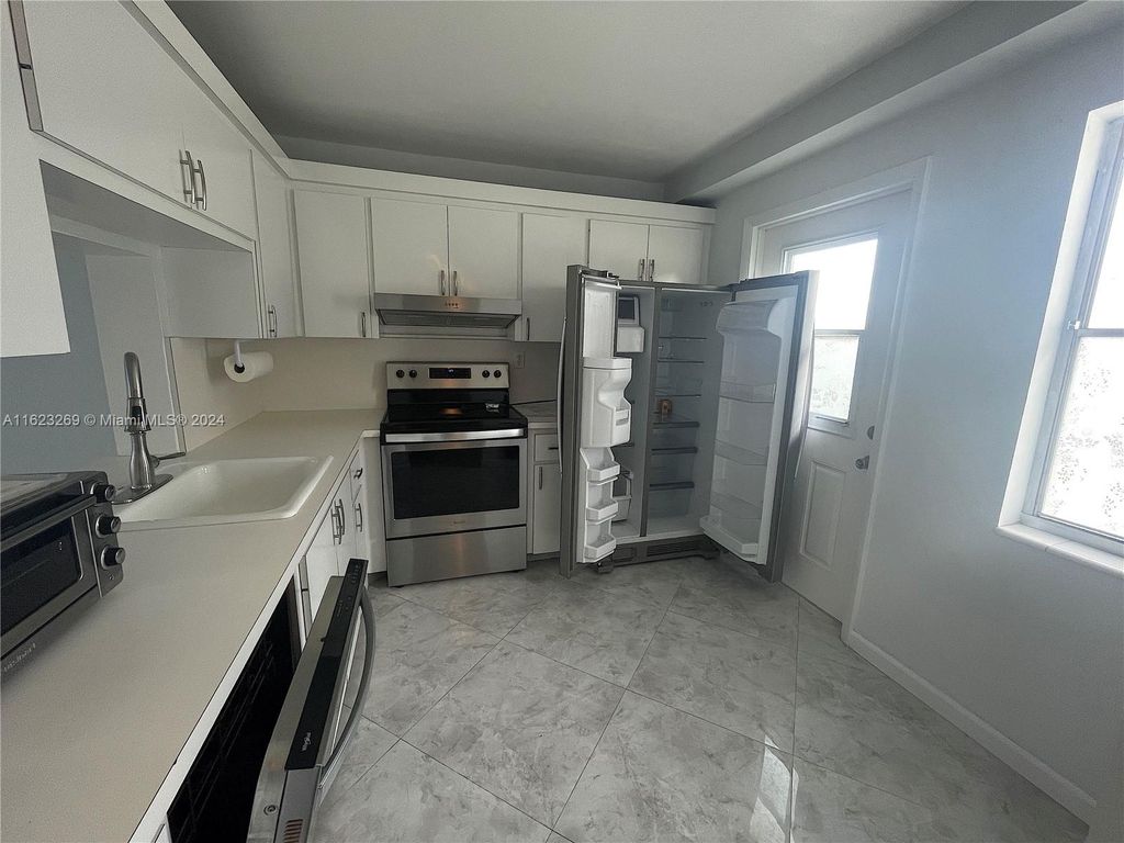 Photo of 1893 S Ocean Dr #410, Hallandale Beach, FL 33009 (MLS # A11623269)