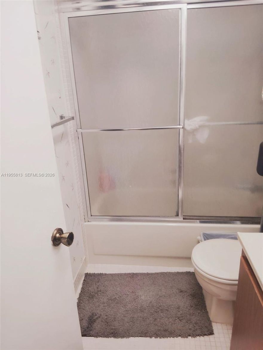 **Attention: Investors** Spacious 1/1.5 centrally located in safe gated all-ages community. Unit features beautiful relaxing water view, washer/dryer in unit. Maintenance includes security gate, water, cable, and internet, plus all amenities including pool, sauna, gym, tennis, basketball courts. **Great investment opportunity - tenant willing to stay