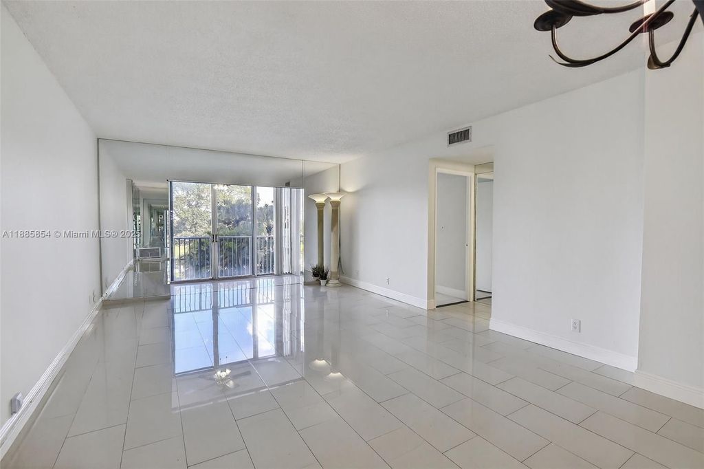 Photo of 4200 Hillcrest Dr #308, Hollywood, FL 33021 (MLS # A11885854)