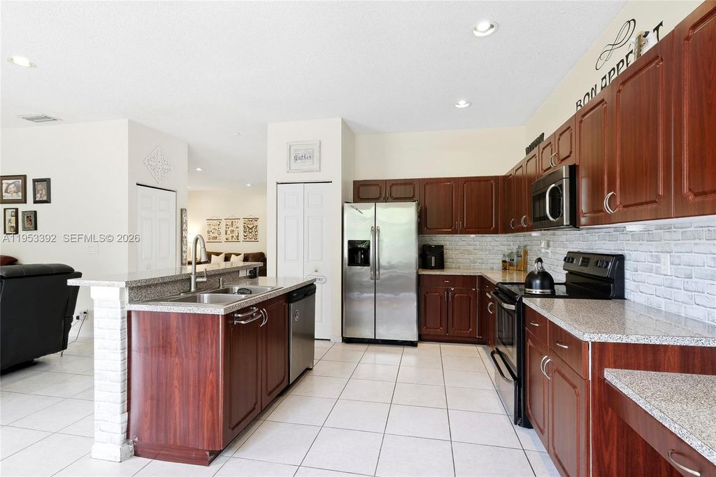 Photo of 15025 SW 19th Ct, Miramar, FL 33027 (MLS # A11953392)