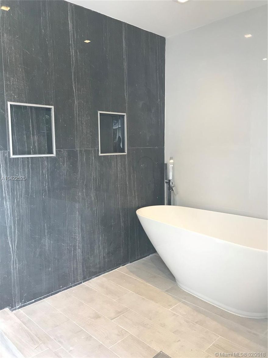 REDUCED ANOTHER $20,000***PRICED TO SELL***IDEAL 4/3 PROPERTY IN PLANTATION FOR FIRST TIME BUYER OR INVESTOR * SELLER MOTIVATED* GREAT CURB APPEAL*FEATURING UNIQUE DESIGNER'S MASTER BATHROOM WITH STAND ALONE BATHTUB AND SHOWER*NEW KITCHEN COUNTERTOPS WITH WATERFALL * EAT IN KITCHEN WITH PLENTY OF CABINETS.  CERAMIC 32X32 WHITE TILE FLOORS IN LIVING / DINING,  LAUNDRY ROOM, BRAND NEW IMPACT WINDOWS, BRAND NEW ROOF, BRAND NEW A/C UNIT. NEW TANKLESS WATER HEATER. BEAUTIFUL REPLASTERED POOL, LARGE FENCED BACKYARD! NEWLY PAINTED EXTERIOR! BEAUTIFUL LANDSCAPING! LOCATED CLOSE TO SHOPPING, SCHOOLS, PARK, RESTAURANTS AND HIGHWAYS. READY TO MOVE IN!