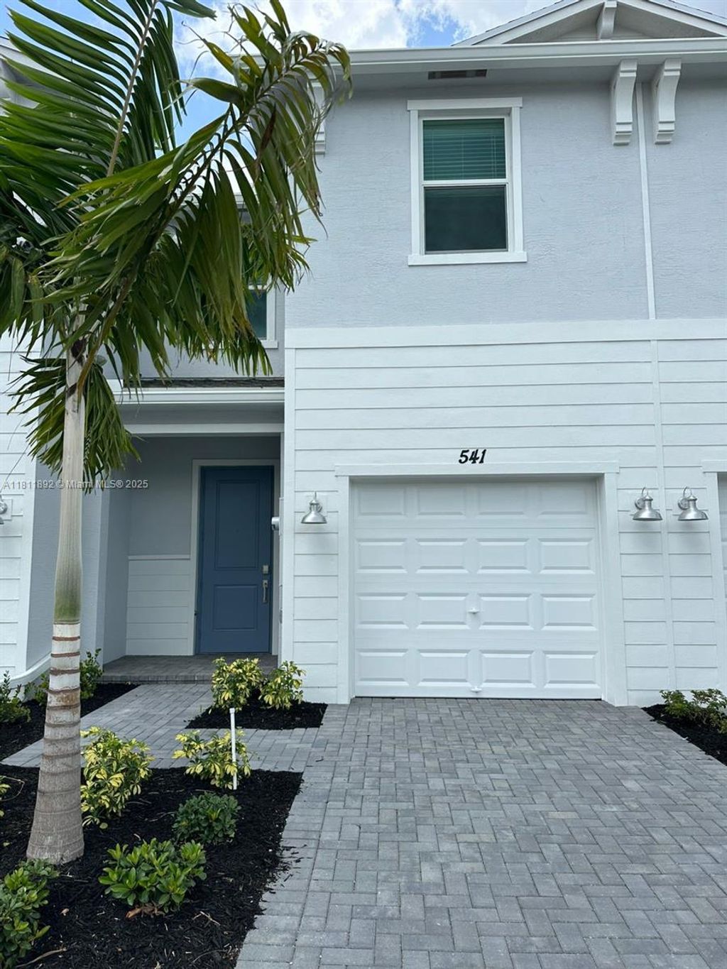 Photo of 541 SE Rivergrass St #541, Port Saint Lucie, FL 34984 (MLS # A11811892)