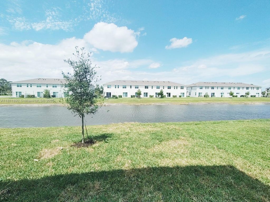 Photo of 541 SE Rivergrass St #541, Port Saint Lucie, FL 34984 (MLS # A11811892)