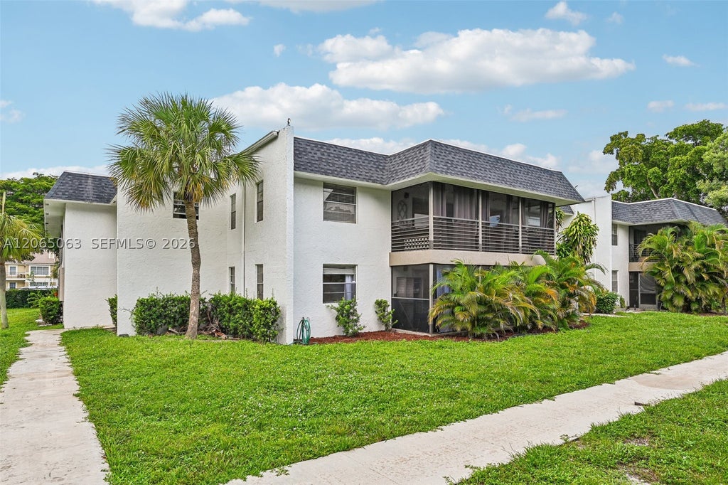 Photo of 2830 Riverside Dr #103-3, Coral Springs, FL 33065 (MLS # A12065063)