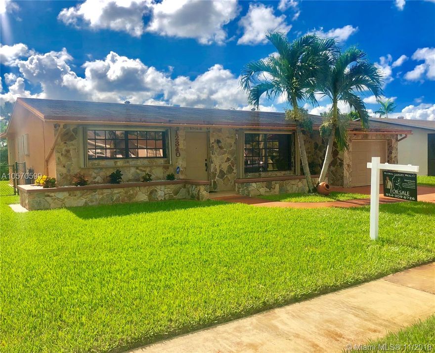 Come and take a look at this perfect starter home for you in Sunrise, located in a quiet and tranquil neighborhood with more than enough space for a BBQ and a pool. Situated on a waterfront lot and well maintained throughout, this home is clean and looks great! No association fee in this green and growing community which is a huge bonus! This home has updated kitchen with tile floors, huge fenced backyard, clean and tranquil lagoon, newly painted and ready for a new loving family to take part and grow in the wonderful city of Sunrise. Please contact me for showings today!!!